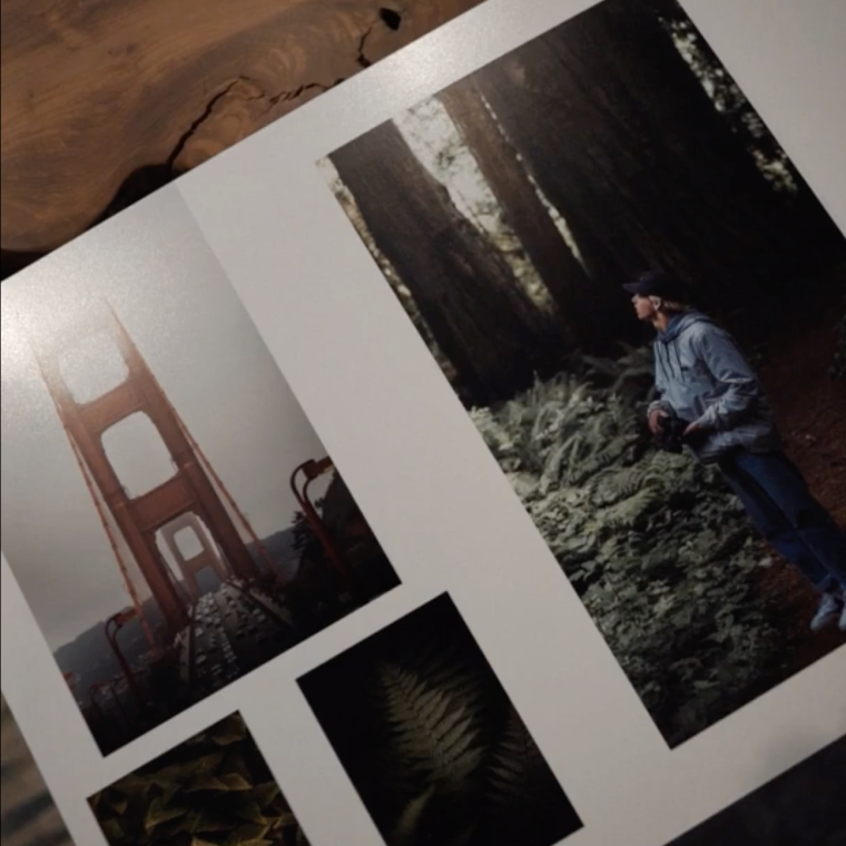 Custom travel photo book gift opened up to show pictures of a person exploring